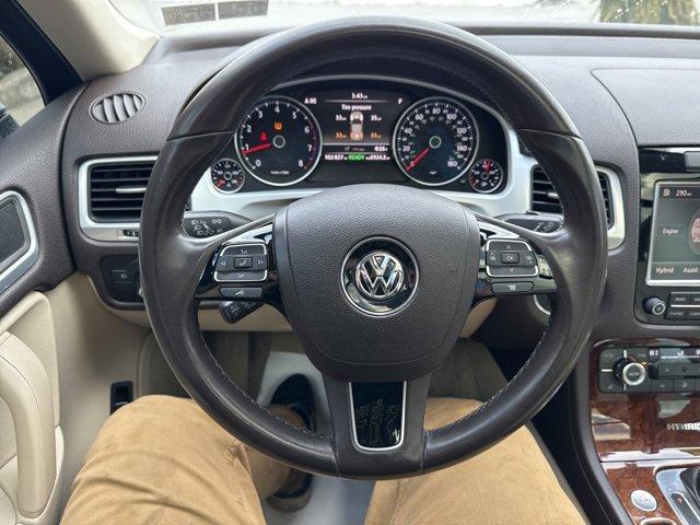 used 2012 Volkswagen Touareg Hybrid car, priced at $11,750