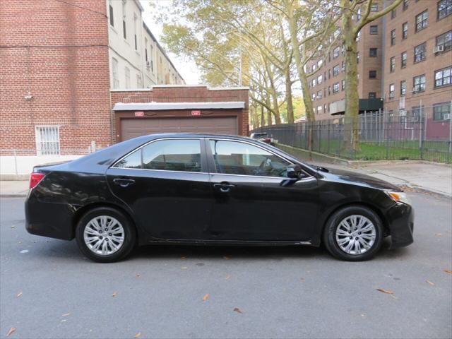 used 2012 Toyota Camry Hybrid car, priced at $3,497