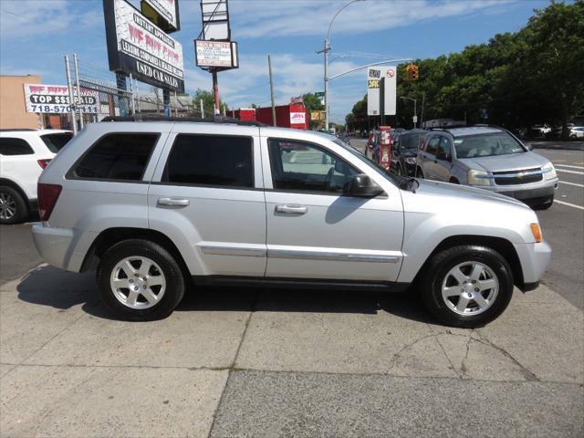 used 2010 Jeep Grand Cherokee car, priced at $8,395