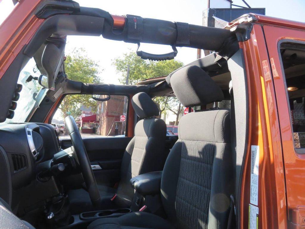 used 2011 Jeep Wrangler Unlimited car, priced at $16,595