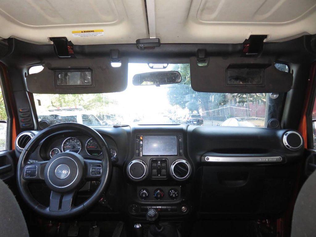 used 2011 Jeep Wrangler Unlimited car, priced at $16,595