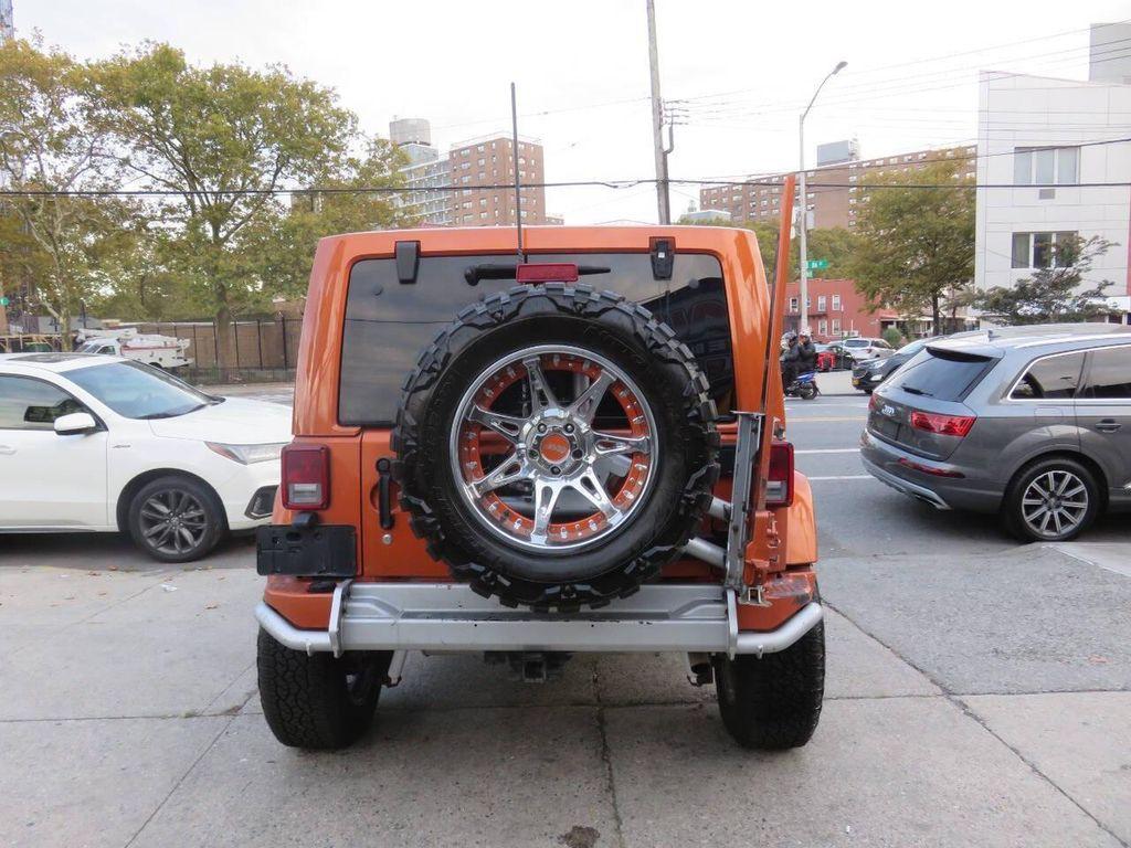 used 2011 Jeep Wrangler Unlimited car, priced at $16,595
