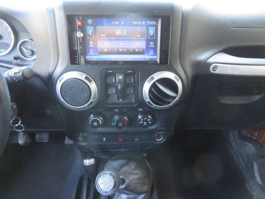 used 2011 Jeep Wrangler Unlimited car, priced at $16,595