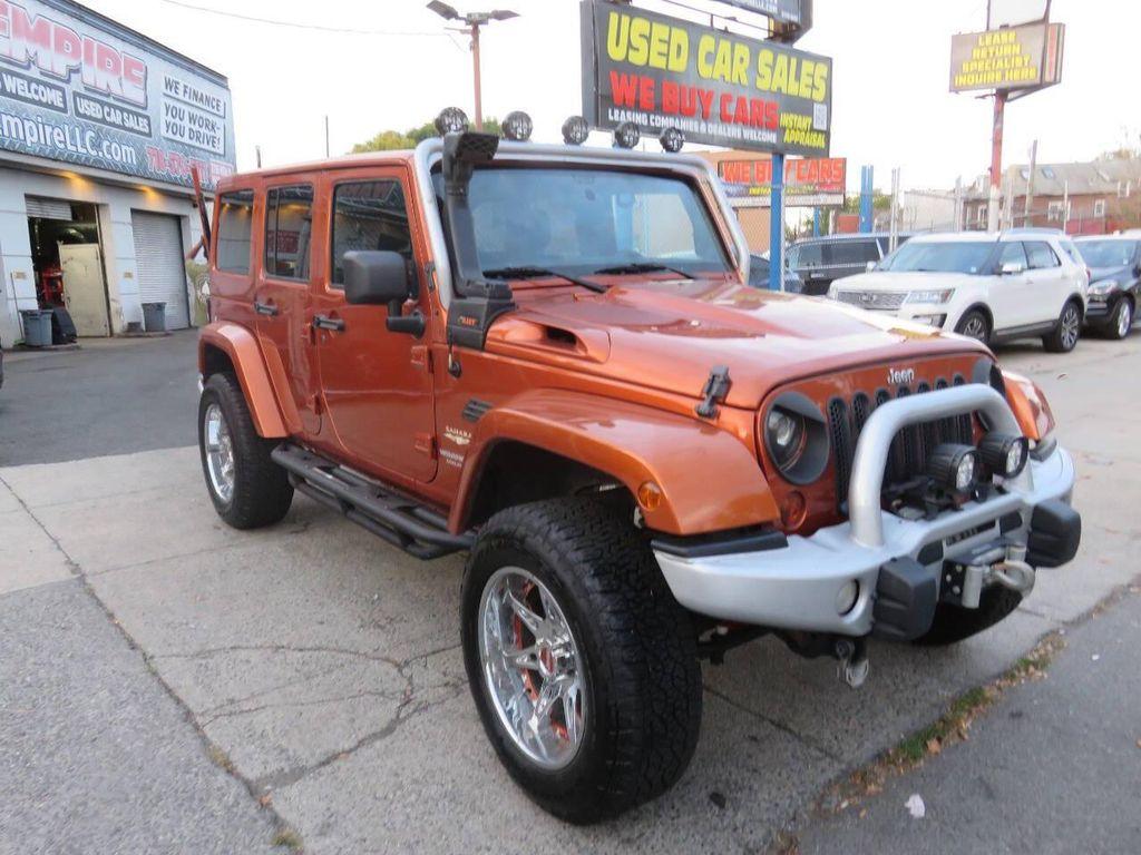 used 2011 Jeep Wrangler Unlimited car, priced at $16,595