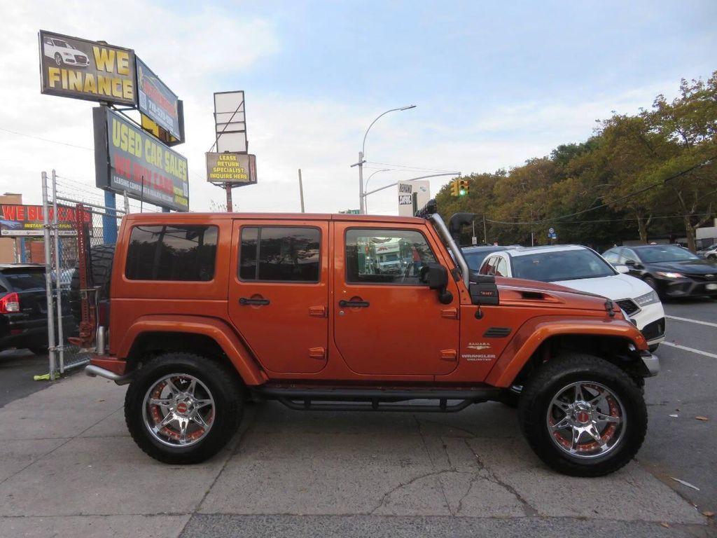 used 2011 Jeep Wrangler Unlimited car, priced at $16,595