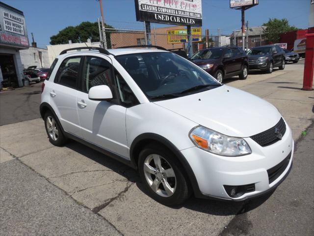 used 2012 Suzuki SX4 car, priced at $7,999