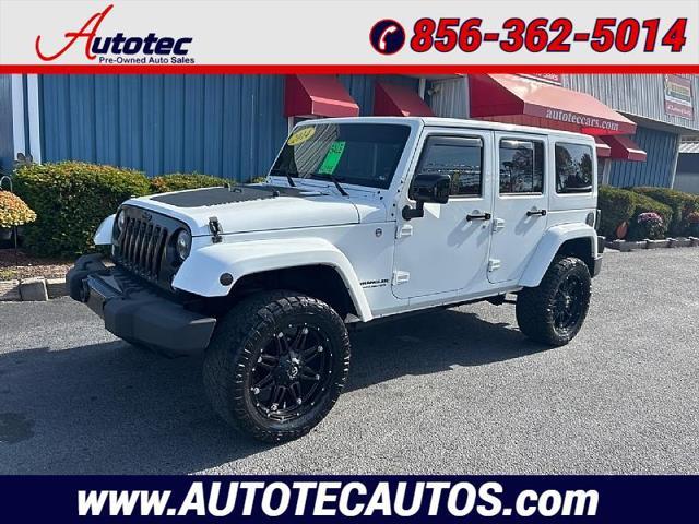 used 2014 Jeep Wrangler Unlimited car, priced at $21,995