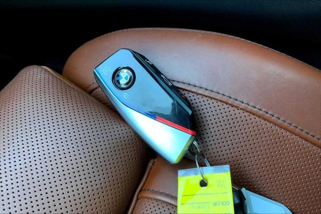 used 2024 BMW X5 car, priced at $77,000
