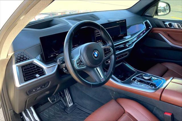 used 2024 BMW X5 car, priced at $77,000
