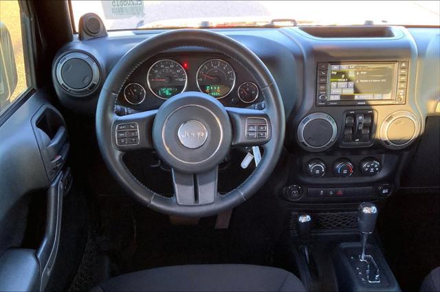 used 2014 Jeep Wrangler Unlimited car, priced at $17,886