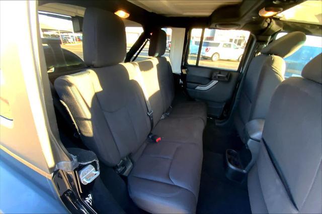 used 2014 Jeep Wrangler Unlimited car, priced at $17,886