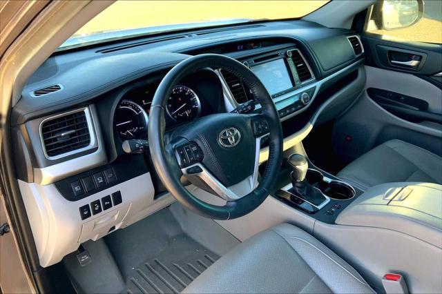 used 2019 Toyota Highlander Hybrid car, priced at $28,126