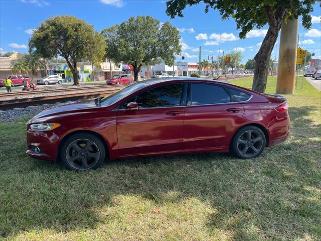 used 2016 Ford Fusion car, priced at $2,299