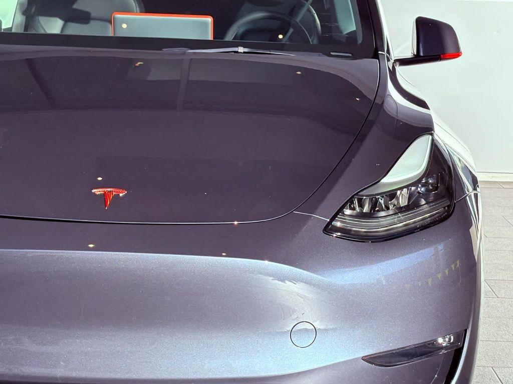 used 2023 Tesla Model Y car, priced at $34,998