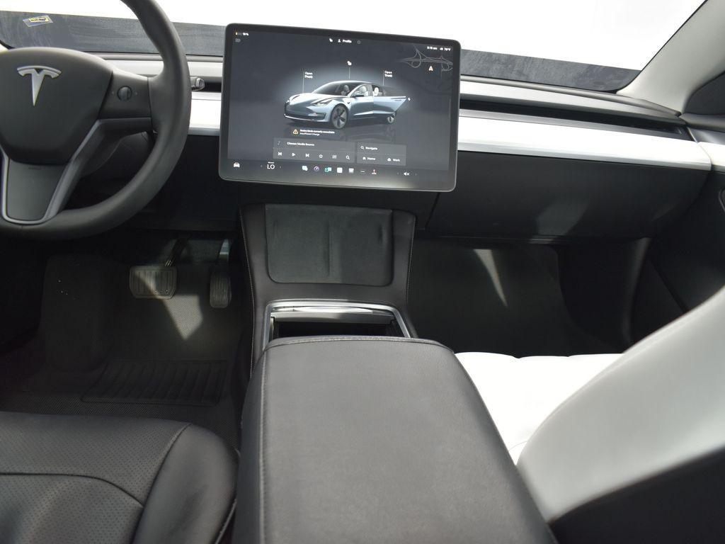 used 2023 Tesla Model 3 car, priced at $27,000
