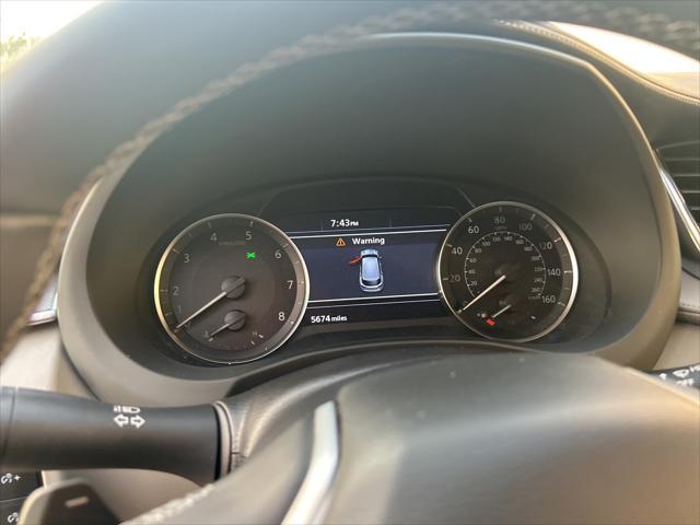used 2023 INFINITI QX50 car, priced at $32,900