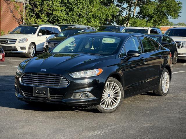 used 2016 Ford Fusion car, priced at $9,995