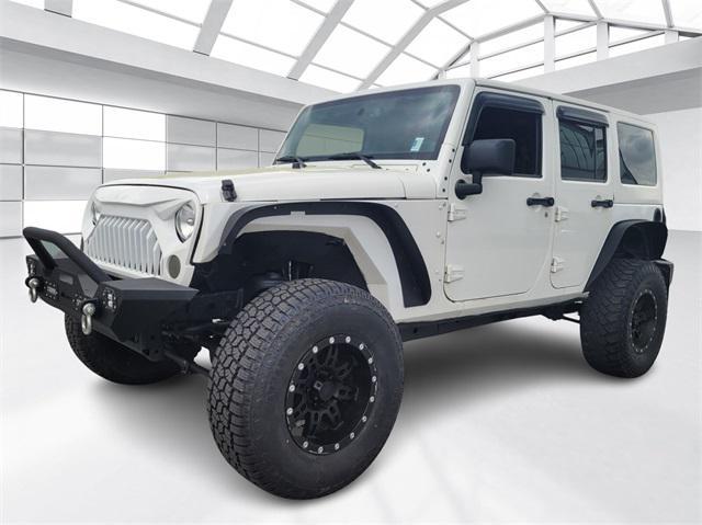 used 2013 Jeep Wrangler Unlimited car, priced at $20,922
