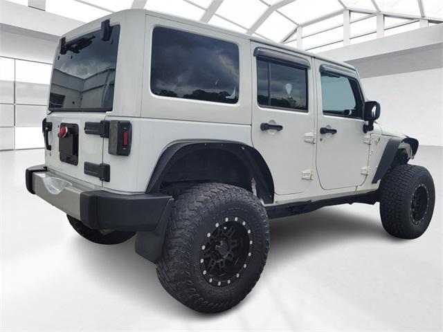 used 2013 Jeep Wrangler Unlimited car, priced at $20,922