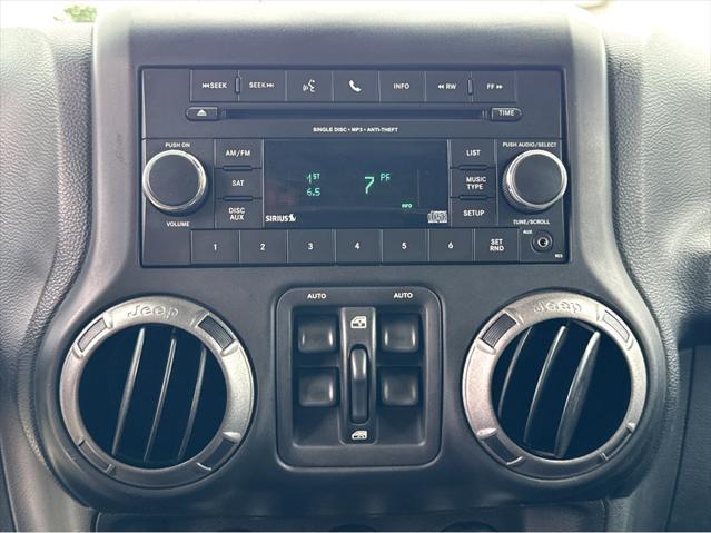 used 2012 Jeep Wrangler Unlimited car, priced at $16,490