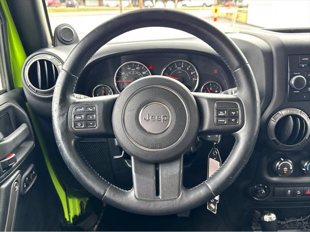 used 2012 Jeep Wrangler Unlimited car, priced at $16,490