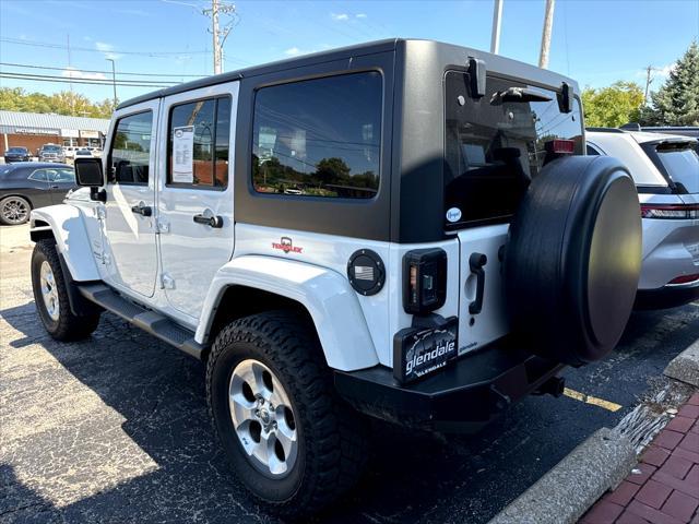 used 2014 Jeep Wrangler Unlimited car, priced at $20,456