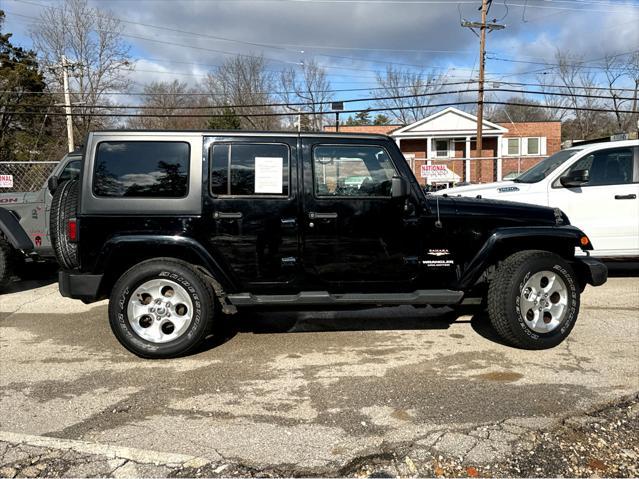 used 2013 Jeep Wrangler Unlimited car, priced at $19,993