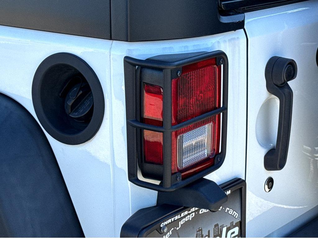 used 2018 Jeep Wrangler JK Unlimited car, priced at $23,500