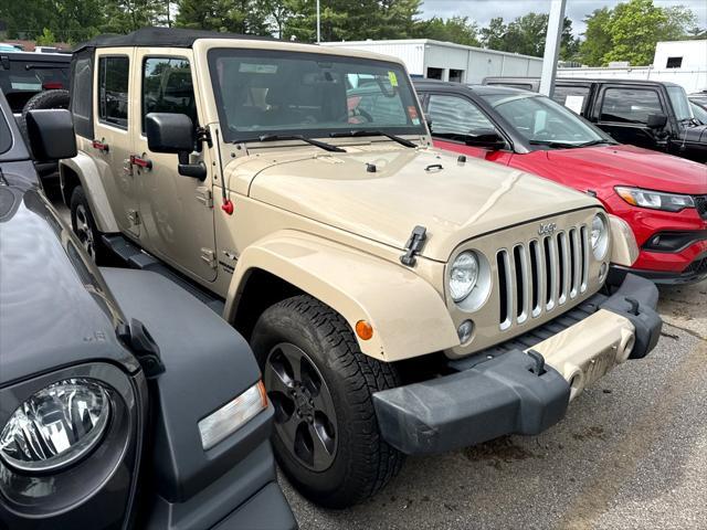 used 2016 Jeep Wrangler Unlimited car, priced at $22,136