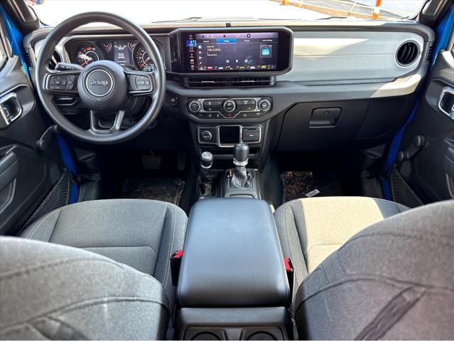 used 2024 Jeep Wrangler car, priced at $33,500