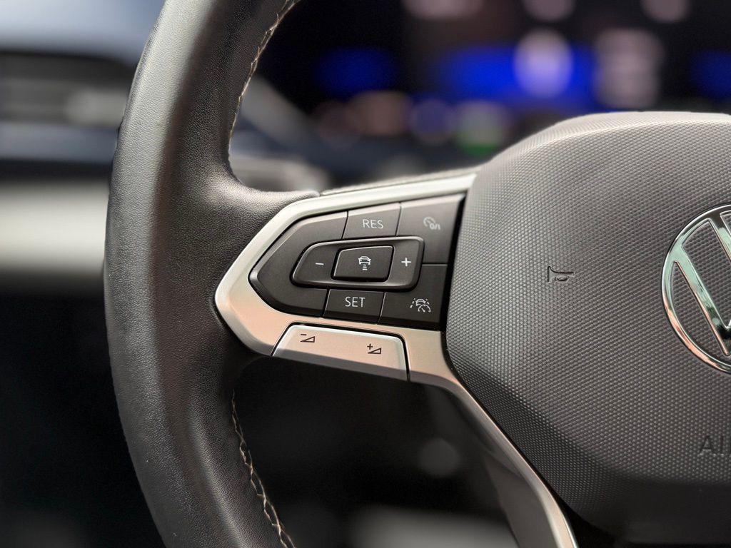 used 2023 Volkswagen Taos car, priced at $20,945