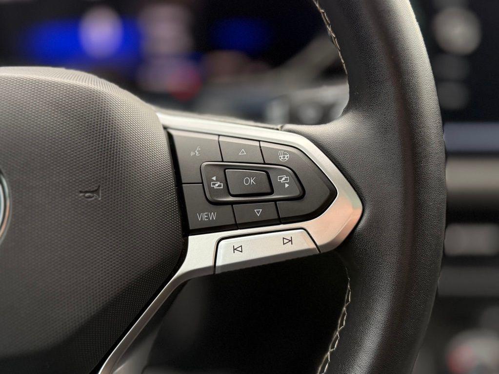 used 2023 Volkswagen Taos car, priced at $20,945