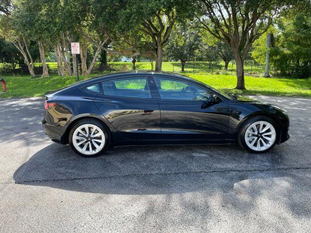 used 2022 Tesla Model 3 car, priced at $24,091