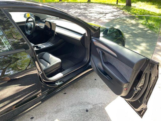 used 2022 Tesla Model 3 car, priced at $24,091