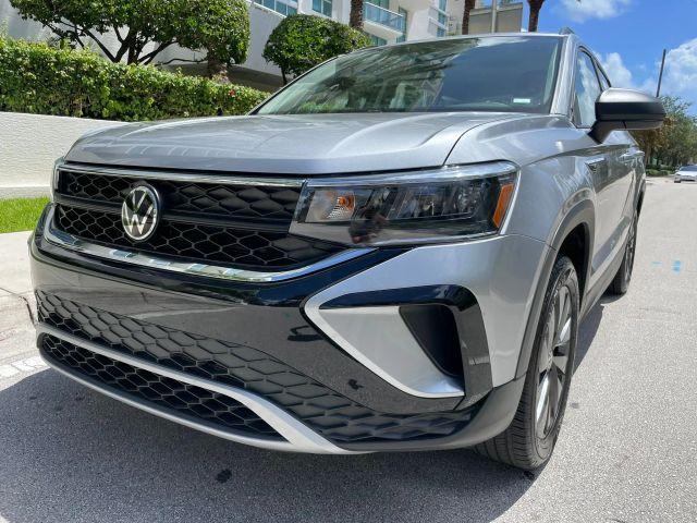 used 2024 Volkswagen Taos car, priced at $23,391
