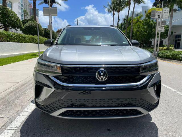 used 2024 Volkswagen Taos car, priced at $23,391