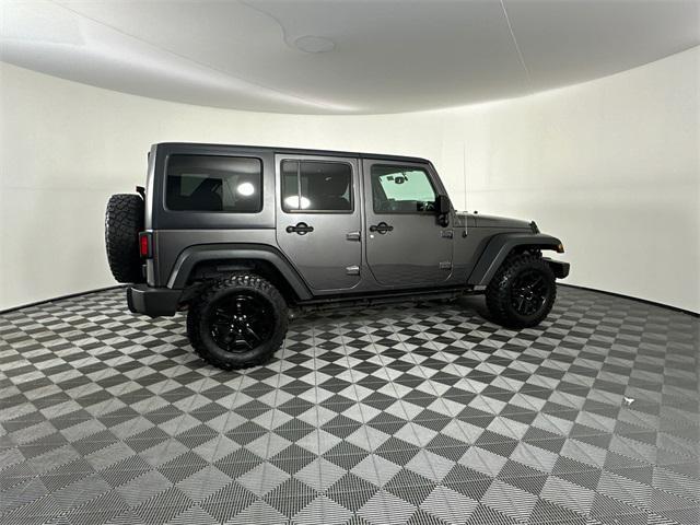 used 2016 Jeep Wrangler Unlimited car, priced at $25,998