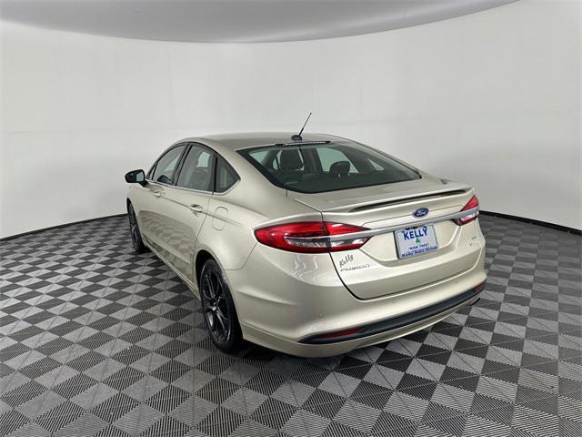 used 2018 Ford Fusion car, priced at $13,495