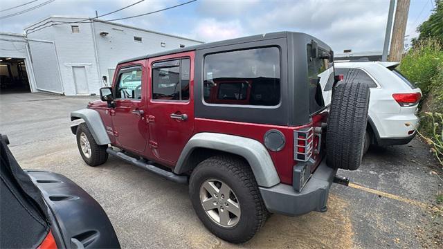 used 2012 Jeep Wrangler Unlimited car, priced at $12,998