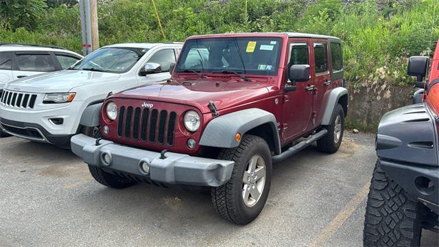 used 2012 Jeep Wrangler Unlimited car, priced at $12,998