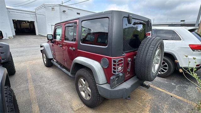 used 2012 Jeep Wrangler Unlimited car, priced at $12,998