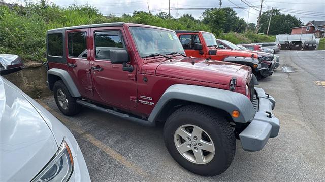 used 2012 Jeep Wrangler Unlimited car, priced at $12,998