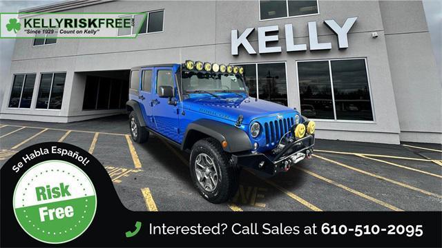used 2016 Jeep Wrangler Unlimited car, priced at $23,970