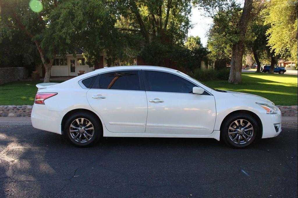 used 2015 Nissan Altima car, priced at $6,995