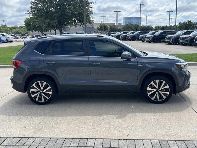 used 2023 Volkswagen Taos car, priced at $22,991