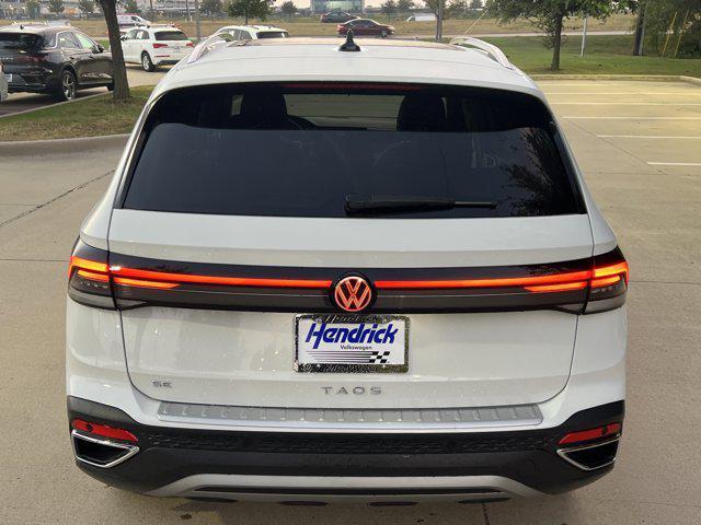 used 2025 Volkswagen Taos car, priced at $27,991