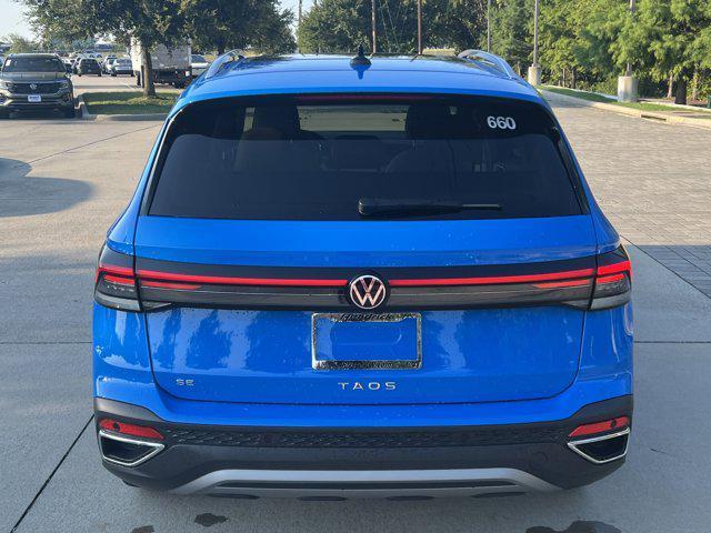 used 2025 Volkswagen Taos car, priced at $26,521