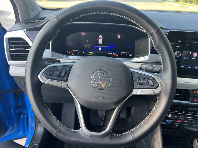 used 2025 Volkswagen Taos car, priced at $26,521