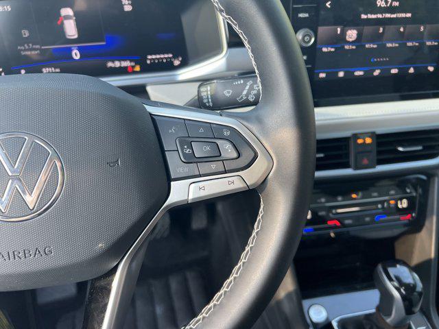 used 2025 Volkswagen Taos car, priced at $26,521