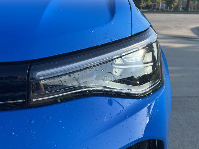 used 2025 Volkswagen Taos car, priced at $26,521